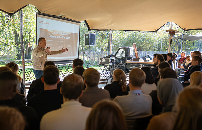 People listening to a presentation