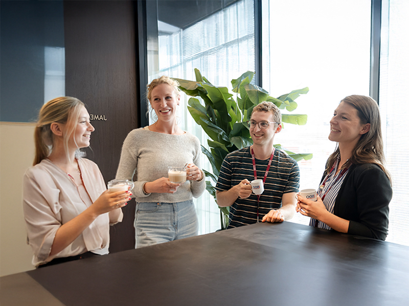 Colleagues enjoying a coffee